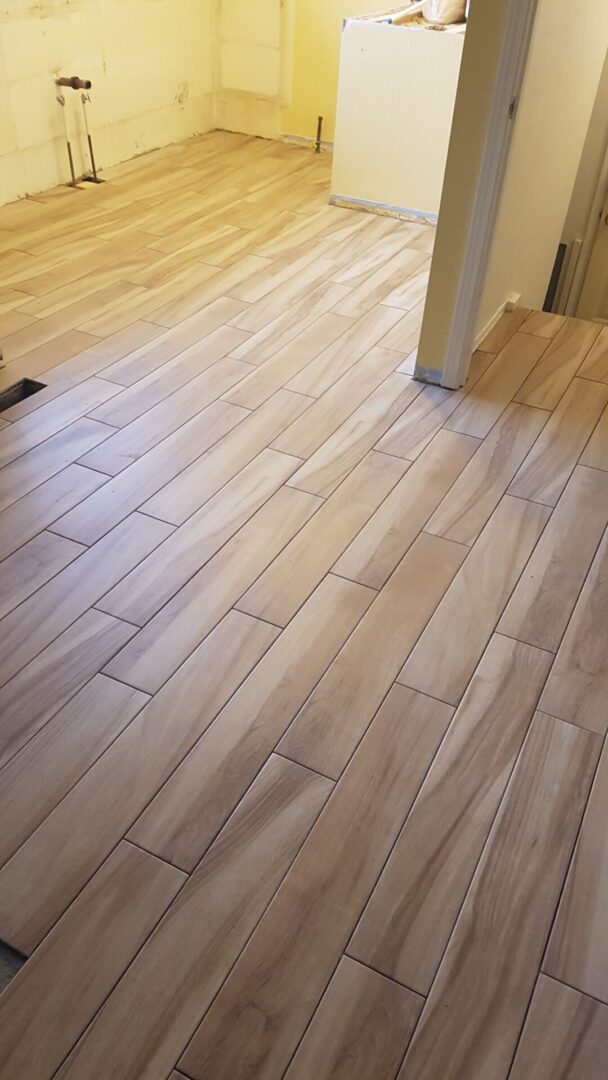 wooden floor with white walls