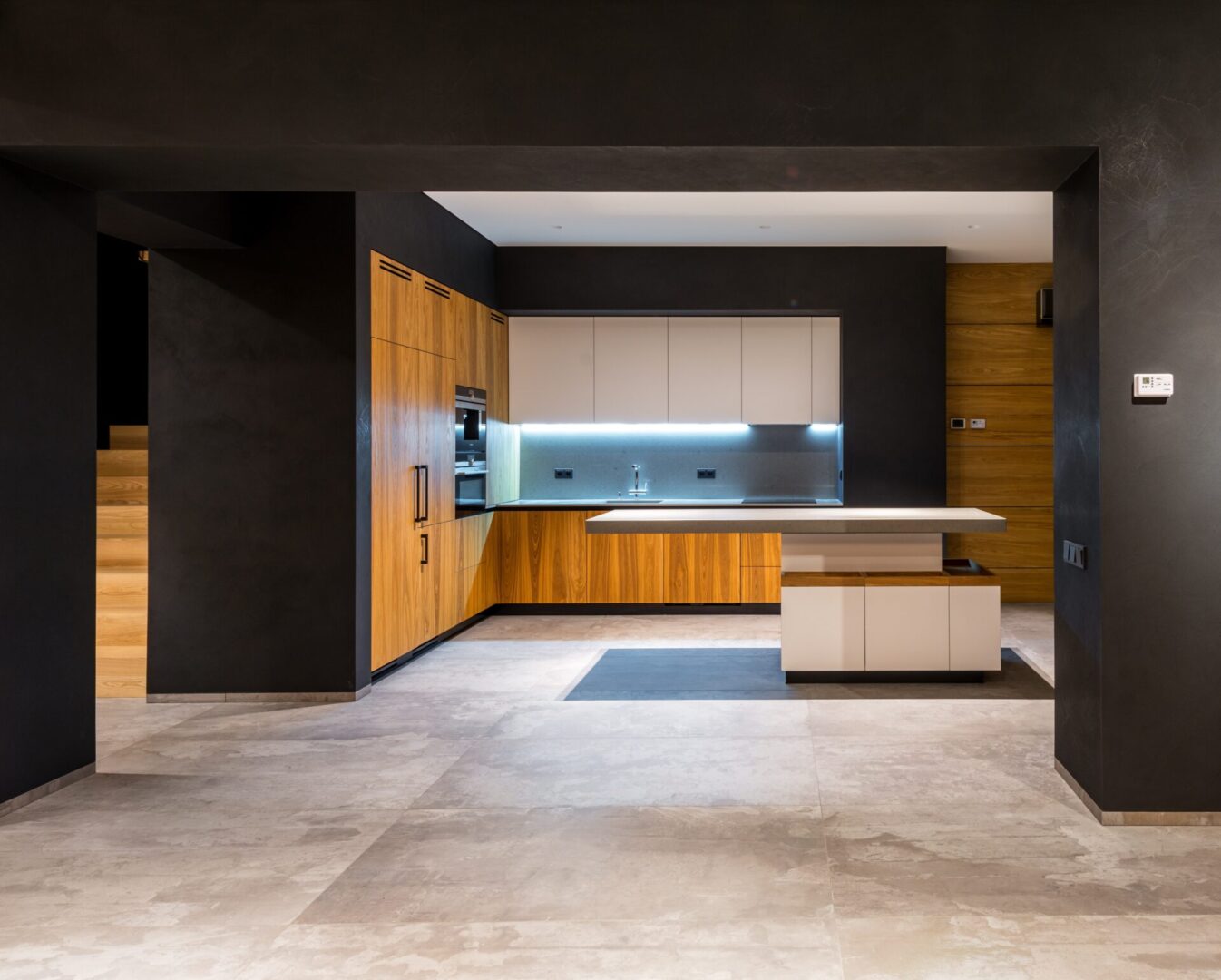 black wall and wood kitchen